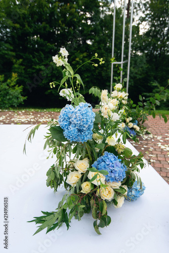 Wedding decorations for newlyweds. In Nature in the garden. Flower decoraions photo