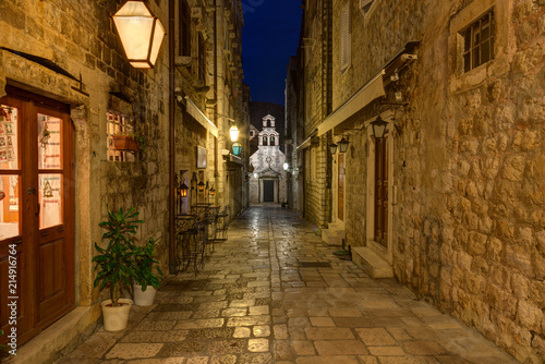 Dubrovnik  night view of the Church of St. Dominic of their alley  lit by street lamps. Croatia.