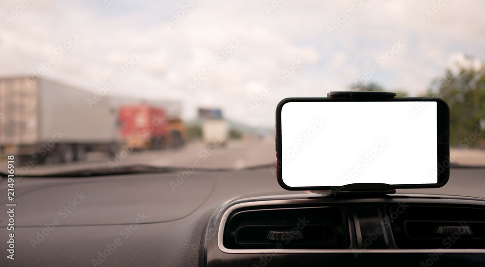 smartphone on the front handle of the car with white screen smartphone on the front handle of the car with white screen