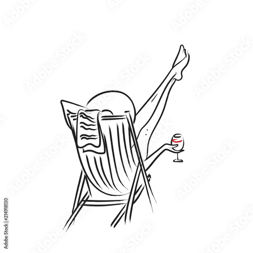 woman chilling in a lounge chair with red wine