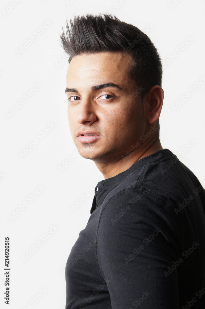 cool young turkish man with spiky hair cool young turkish man with spiky hair