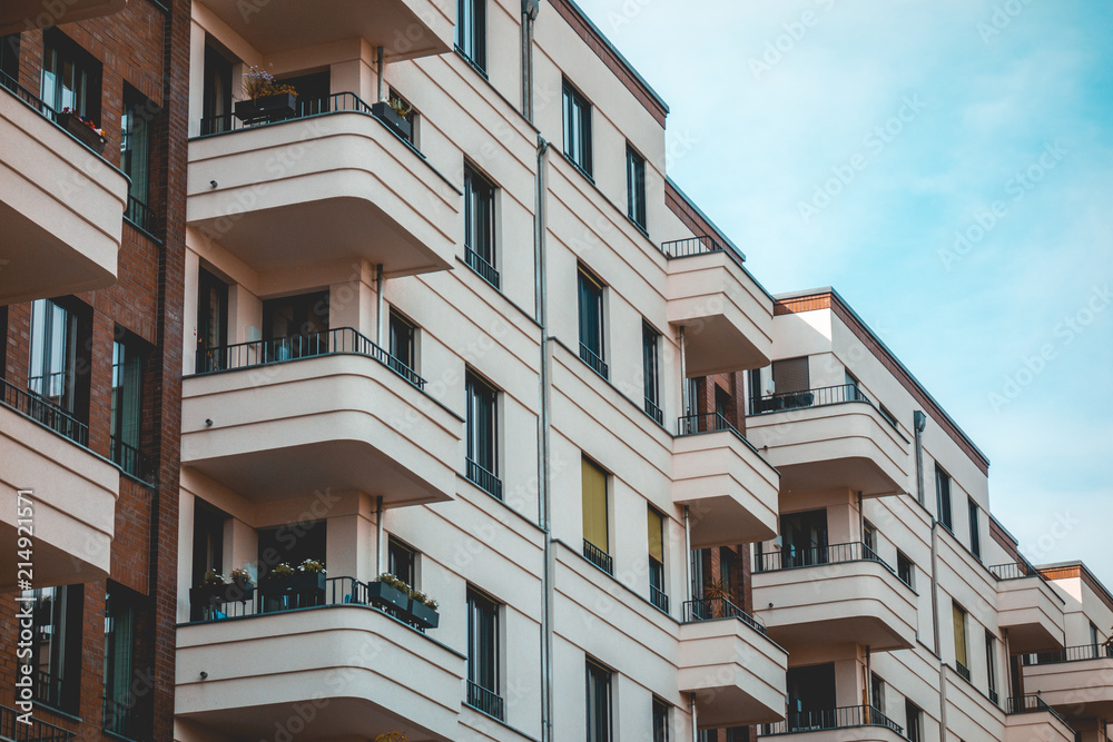 white and brown colored real estate apartment houses white and brown colored real estate apartment houses