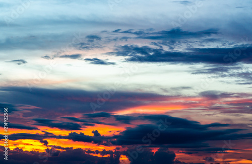 colorful dramatic sky with cloud at sunset.