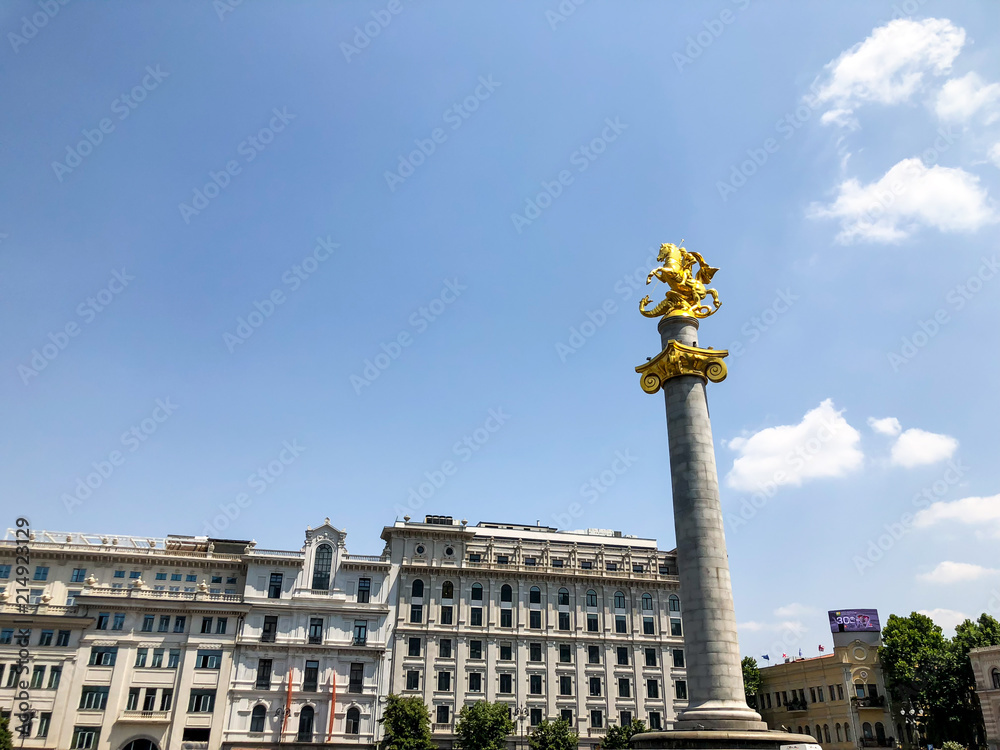 TBILISI, GEORGIA - July 10, 2018: View of the  freedom square and the Freedom Monument (St. George Statue) in Tbilisi, Goergia
