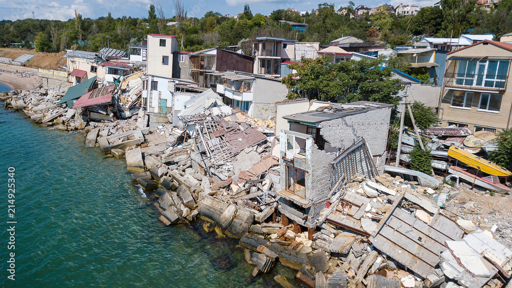 The destroyed house after the earthquake on the seashore