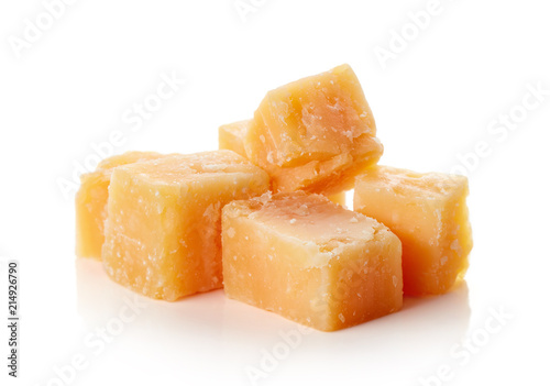 Parmesan cheese cubes isolated on white