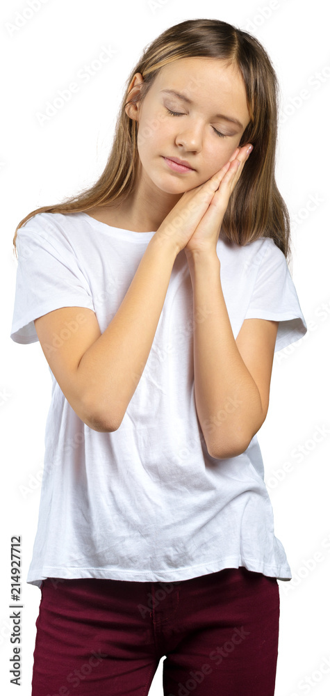 Beautiful young woman sleeping tired dreaming and posing with hands together Beautiful young woman sleeping tired dreaming and posing with hands together