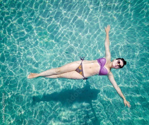 girl floating on the watter