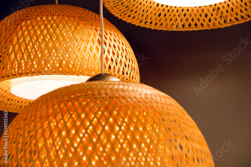 Rattan weave close-up. The green fabric lampshade at the magazine. colorful, decorative, electrical, furniture, illumination, lamp, lampshade, style, textile, abstract background, hanging lamp photo