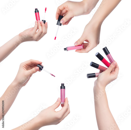 Set of female hands with lipsticks on white background