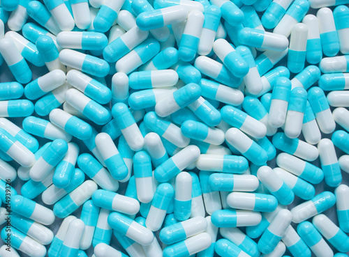 medicine drug capsule white and blue