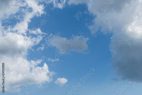 White clouds in summer blue sky photo