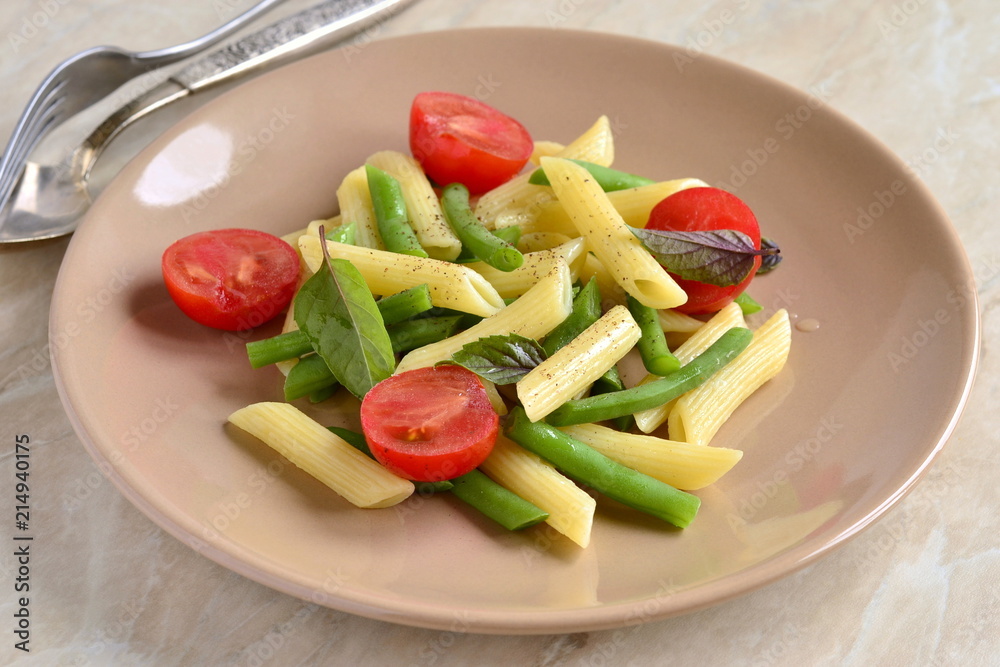 Penne pasta with green beans, cherry tomatoes and basil Penne pasta with green beans, cherry tomatoes and basil