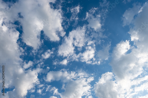 White clouds in summer blue sky photo