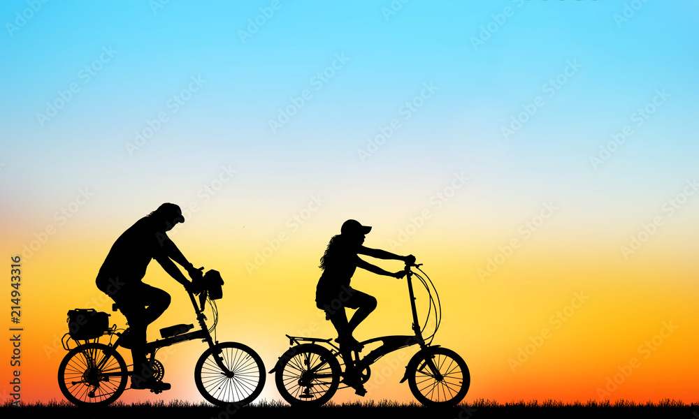 silhouette Sport man whit bike on sunrise