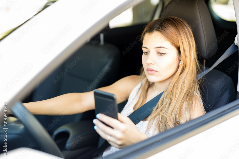 Reckless female texting while driving