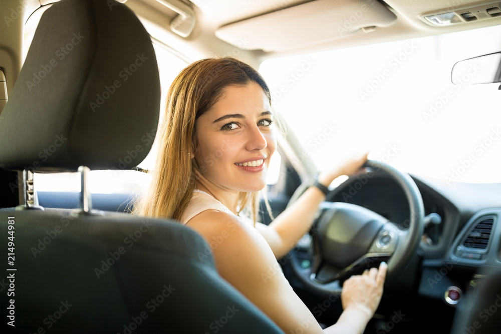 Beautiful woman driving her car