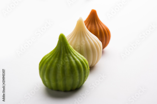 Photography Sweet Tiranga coloured modak shape mithai or dumpling for Independence or republ