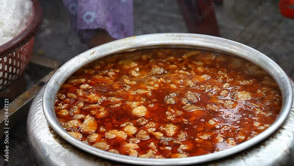Asian street food. A large vat of soup close-up Asian street food. A large vat of soup close-up