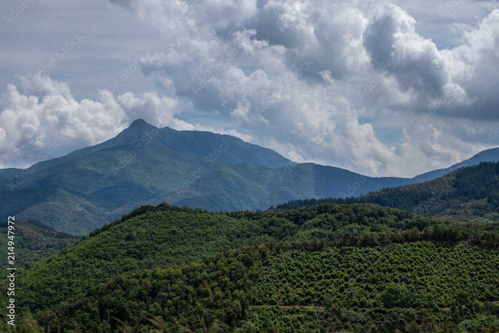 Cloudy autumn landscape on green mountains peak Cloudy autumn landscape on green mountains peak