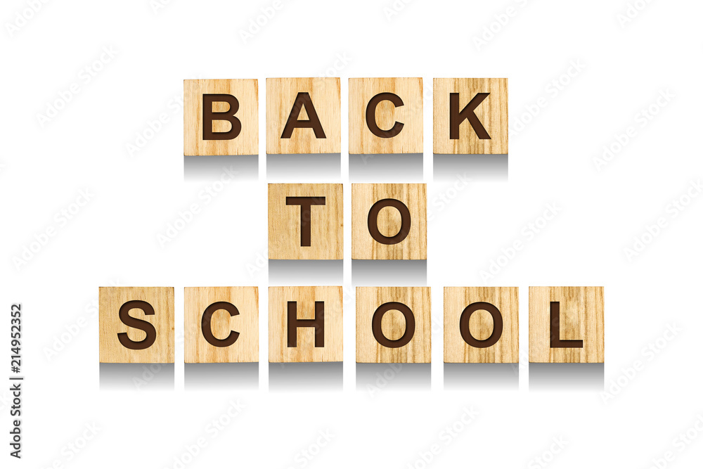 Back to school. An inscription from the alphabet on cubes. White background. Isolated. Back to school. An inscription from the alphabet on cubes. White background. Isolated.