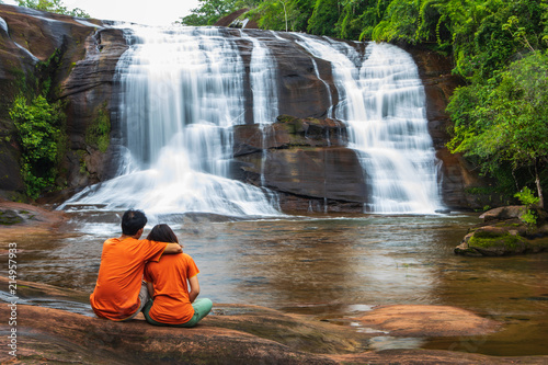 Lovers are happy in Jet-Sri waterfall, Beautiful waterfall in Bung-Kan province, ThaiLand.