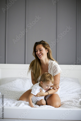 Young mother with son in th...