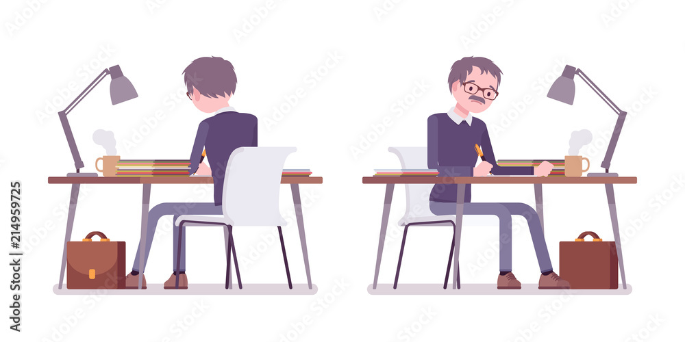 Male teacher sitting and working at the desk