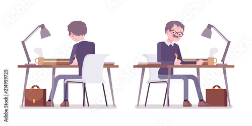 Male teacher sitting and working at the desk