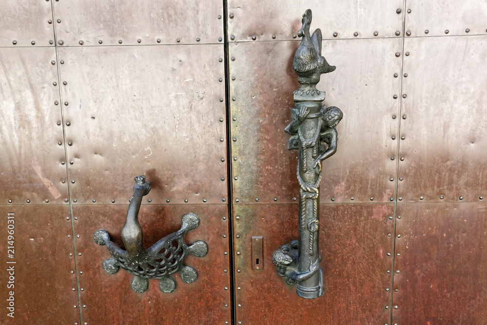 Door handle in The High Cathedral of Saint Peter in Trier, Germany. Door handle in The High Cathedral of Saint Peter in Trier, Germany.