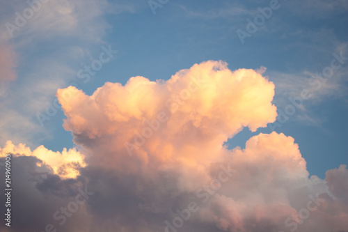 Amazing clouds in the evening sunlight. Summer fairy sky © Anna