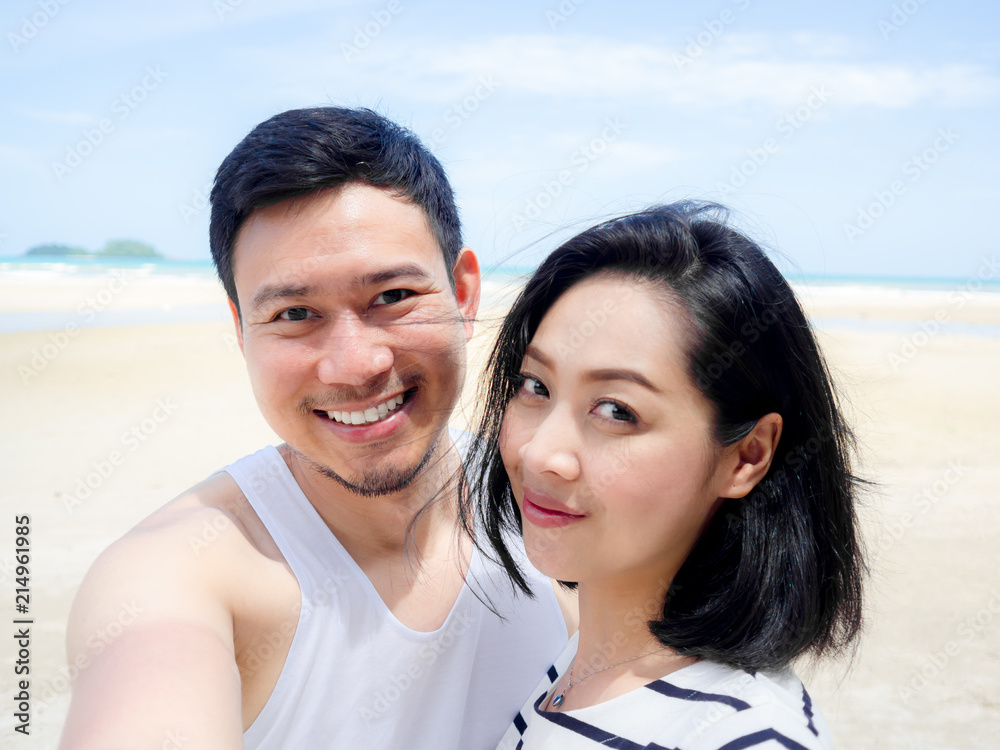 Happy lover couple on summer beach vacation. Happy lover couple on summer beach vacation.