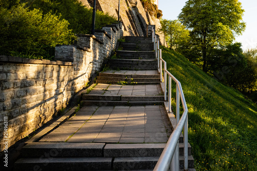 Fototapeta Naklejka Na Ścianę i Meble -  Staircase in old town of Tallinn, Estonia. Nice sunny evening in summer.