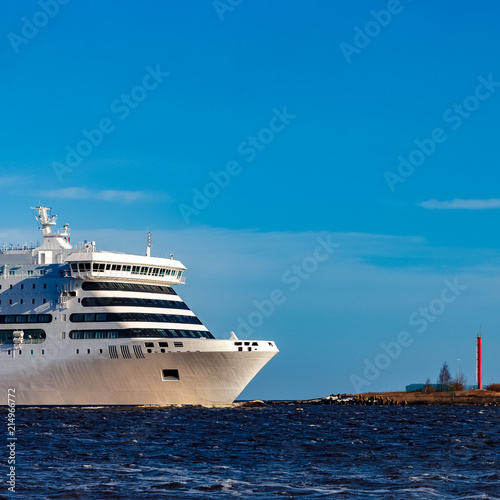 White passenger ship underway