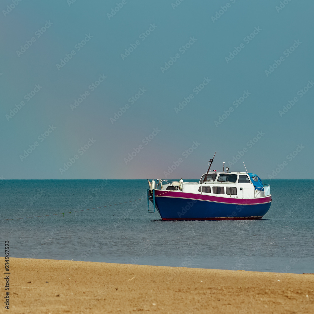 Small blue passenger ship