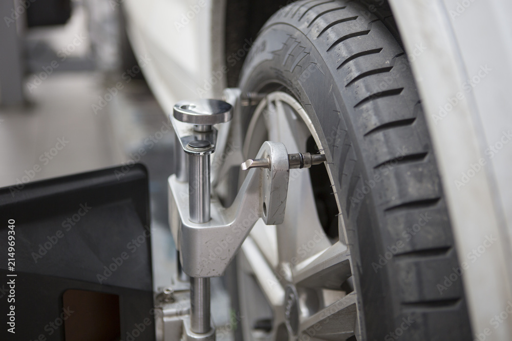 Fototapeta premium Equipment for checking the geometry of the wheels of the car