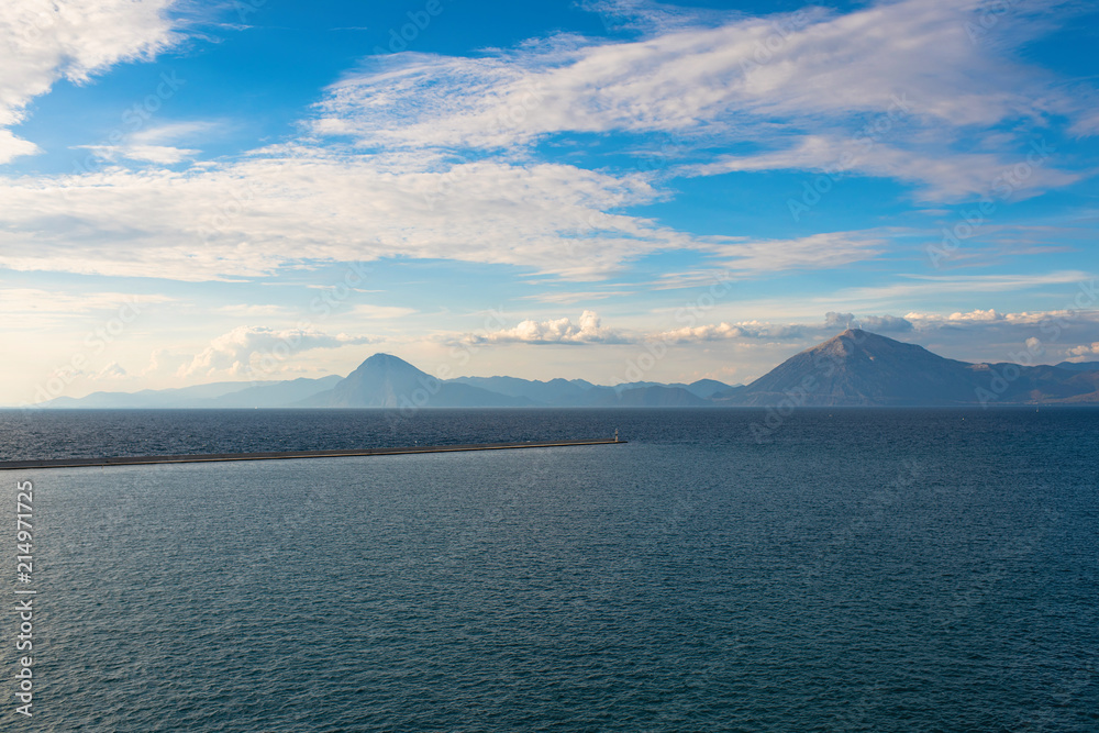 View of the Greek island of Makri from the ferry at sunset. Greek islands in the Ionian Sea