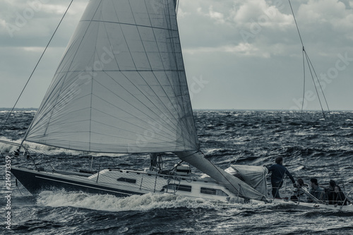 Blue sailboat at storm © InfinitumProdux