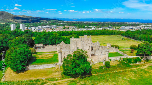 Aerial view over Craigmillar Castle and the city of Edinburgh photo