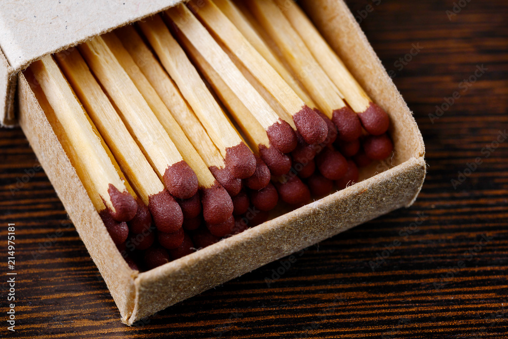 closeup of open box of wooden matches closeup of open box of wooden matches