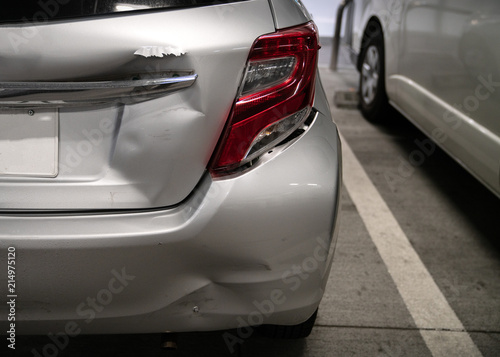 Backside of new silver car get damaged by accident