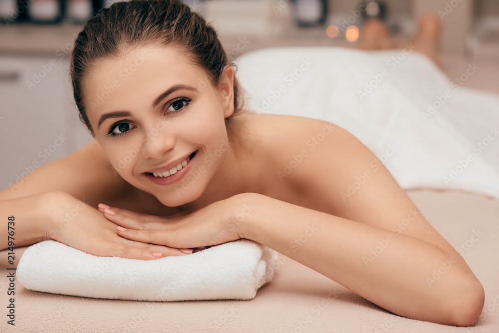 Cropped shot of an woman with perfect fresh skin lying on a massage table and looking at camera. Getting rid of all the tension Cropped shot of an woman with perfect fresh skin lying on a massage table and looking at camera. Getting rid of all the tension