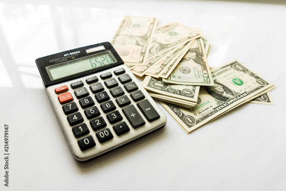 Close-up Money and Calculator, American Dollar Banknotes Close-up Money and Calculator, American Dollar Banknotes