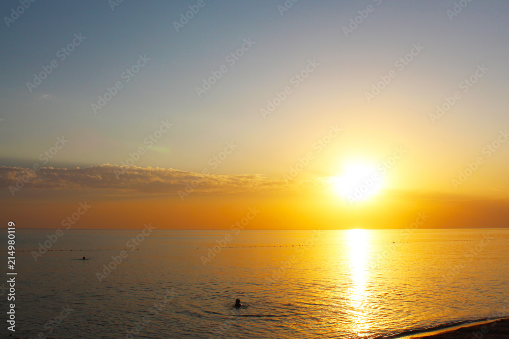 Naklejka premium Seascape with sundown sun