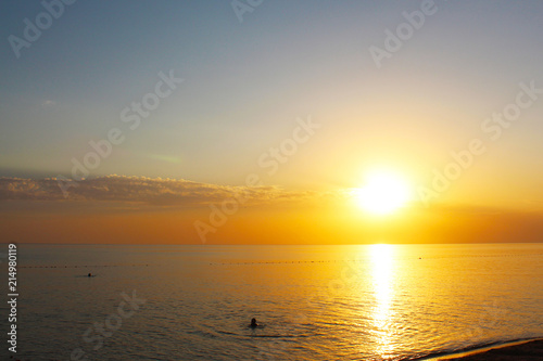 Seascape with sundown sun