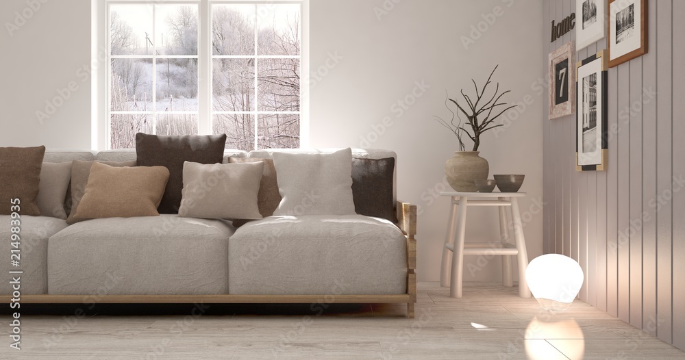 Fototapeta premium White room with sofa and winter landscape in window. Scandinavian interior design. 3D illustration