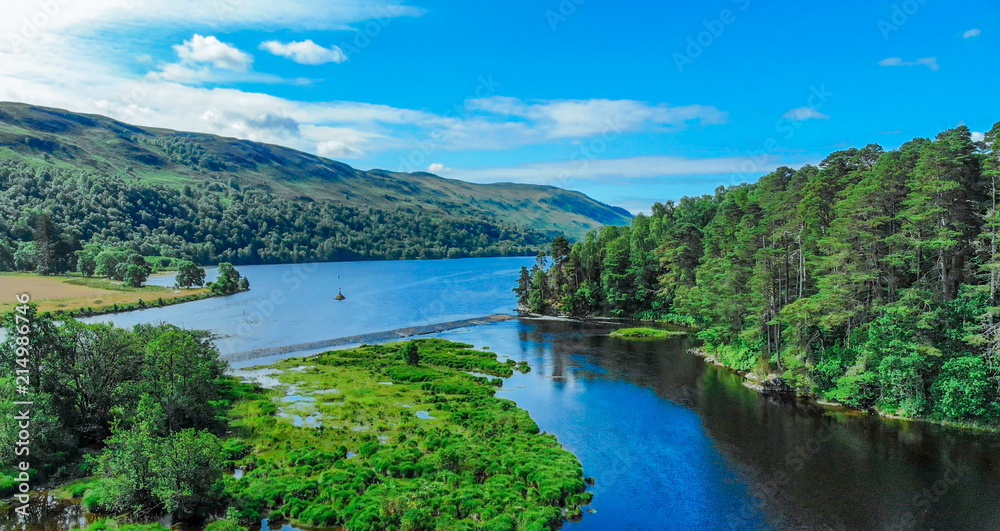 Amazing landscape with creeks and lakes in the Scottish Highlands - romantic aerial view