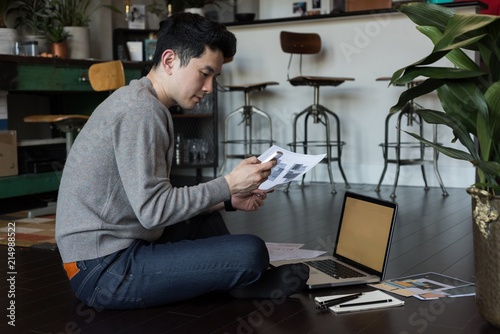 Man working on a project at home photo