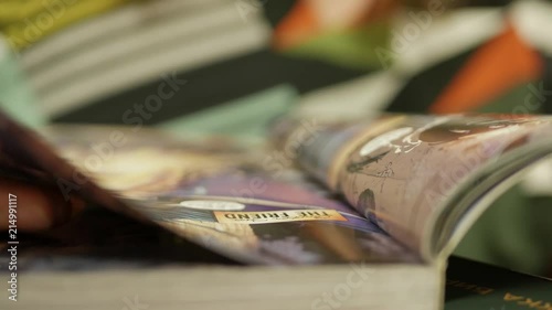 Girl reading a comic book - shallow depth of field - female geek nerd