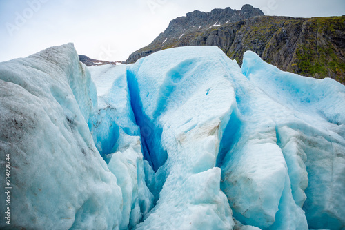 Part of blue Svartisen Glacier in Norway photo